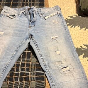 Distressed Light Blue Jeans
